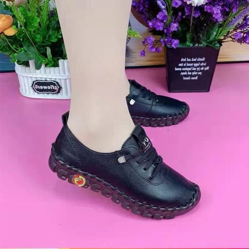Chaussures plates à enfiler en cuir 